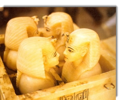 Finely modelled calcite heads from canopic chest Tut's tomb